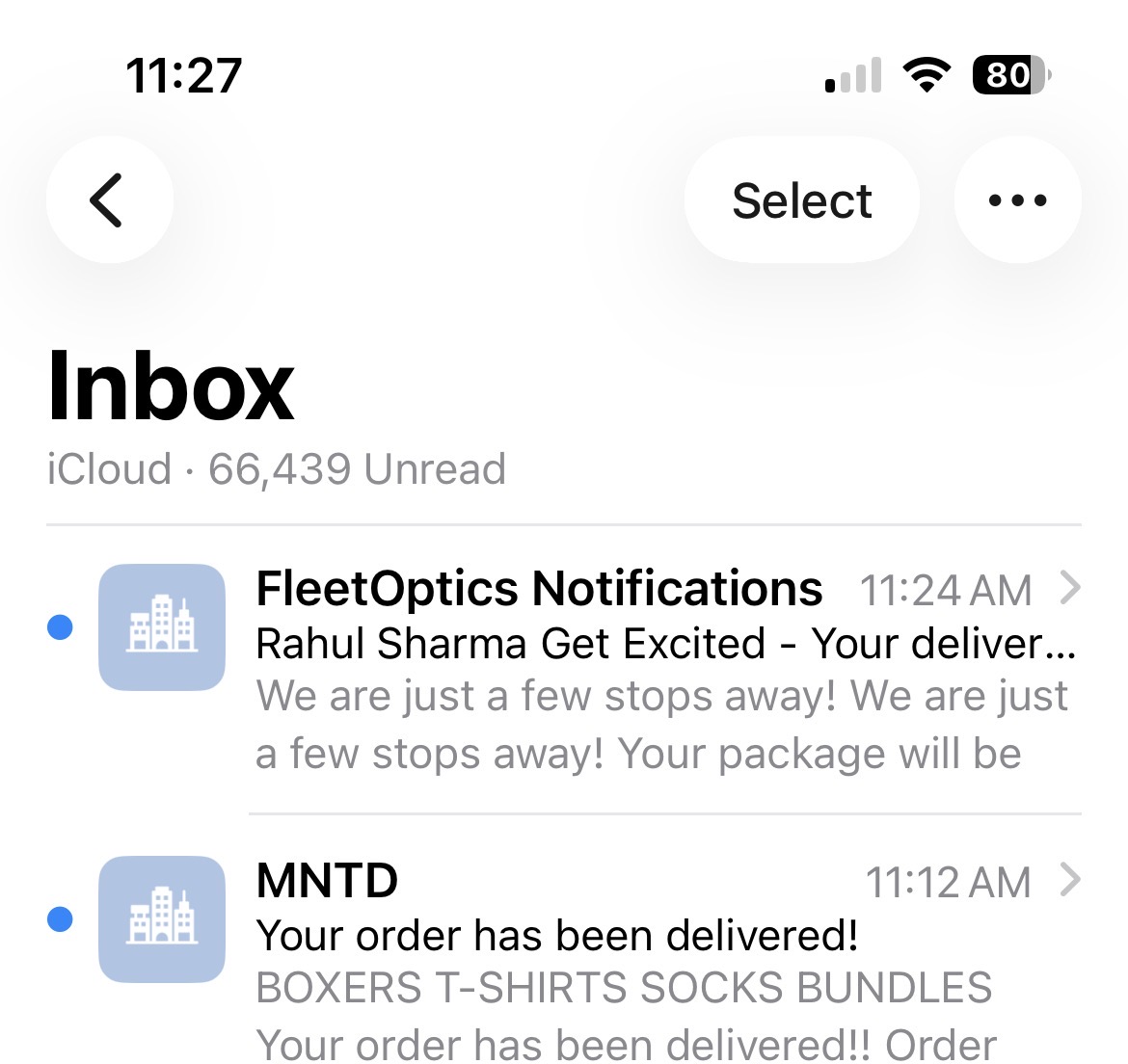 iCloud inbox showing FleetOptics Notifications at 11:24 AM (Get Excited - Your delivery is coming up next) and MNTD at 11:12 AM (Your order has been delivered!) — two delivery notifications within 12 minutes from two different senders